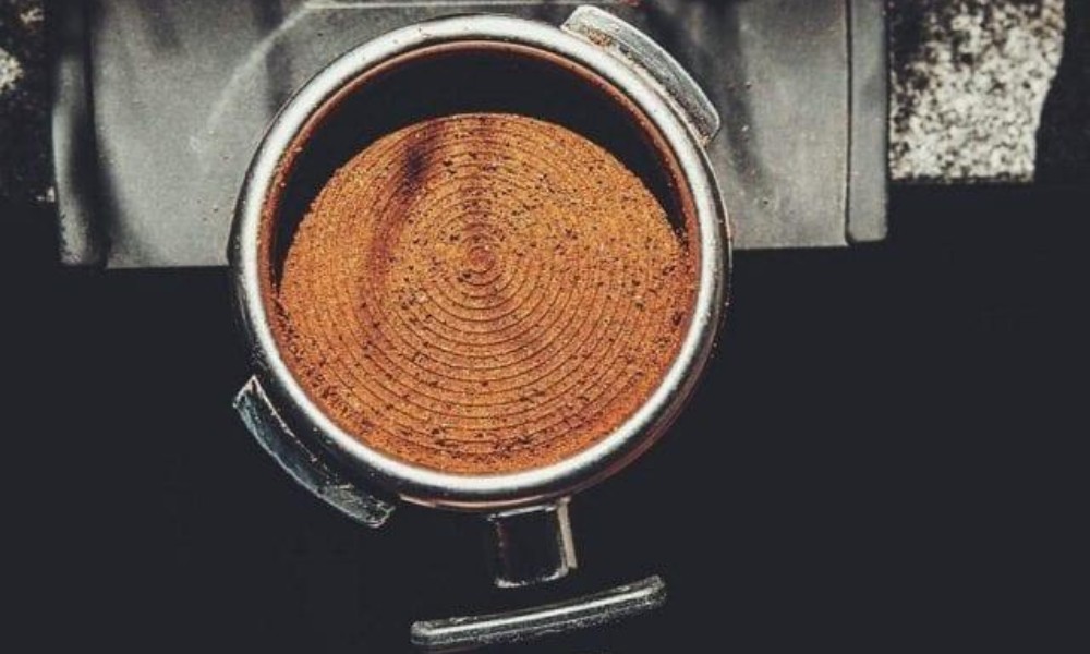 Tamper con café