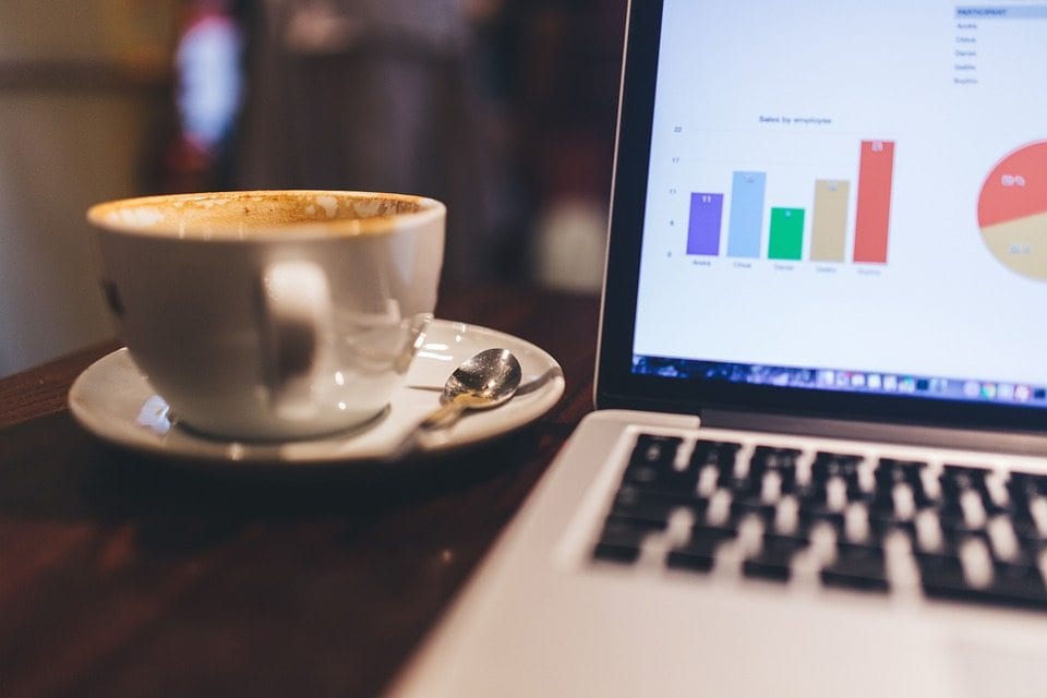 coffee cup and laptop