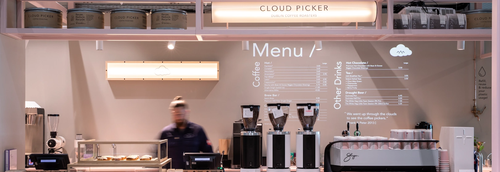 A barista behind the bar at Cloud Picker Coffee in Dublin, Ireland.