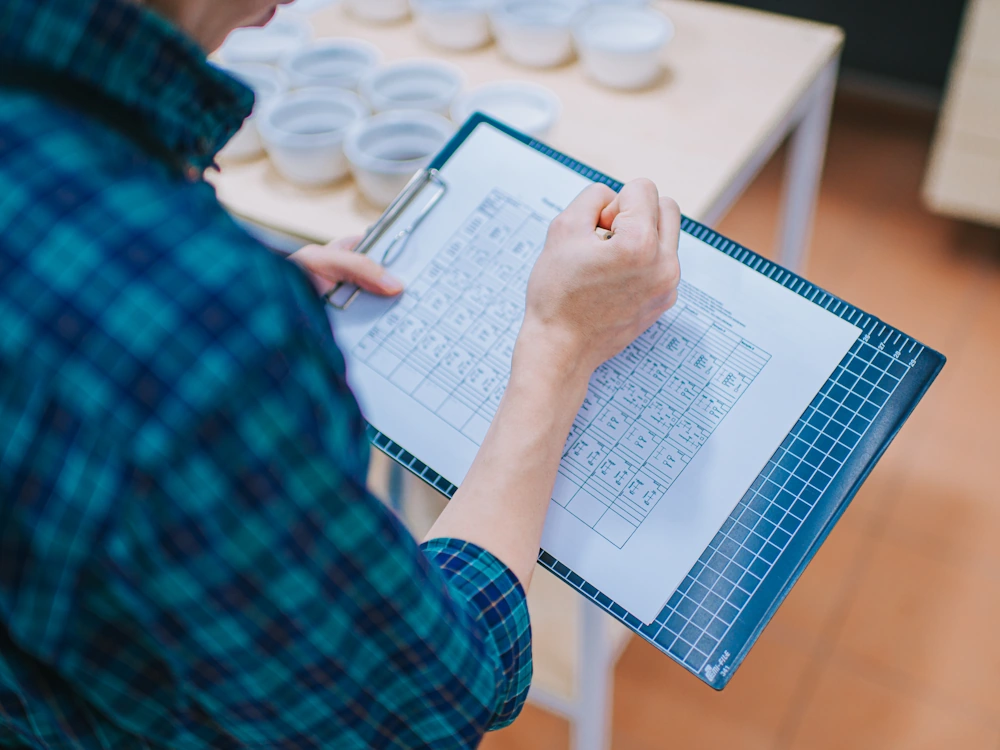 A Q grader scores a coffee.